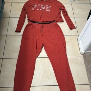 Women pink Victoria’s Secret two-piece outfit